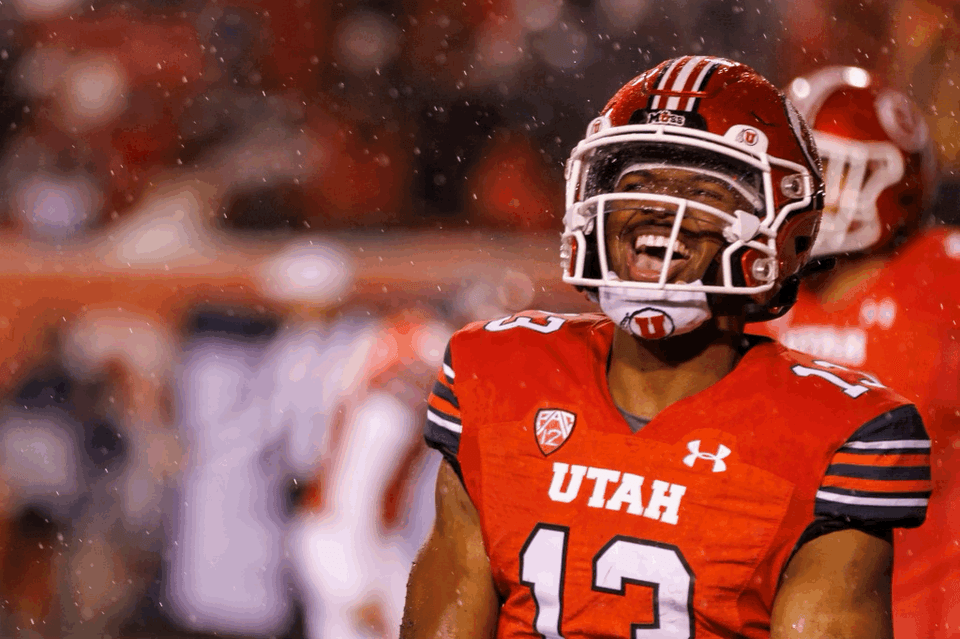 True freshman QB Nate Johnson – 2 TDs on the night – celebrating during a 45-20 Utah win in Salt Lake City.